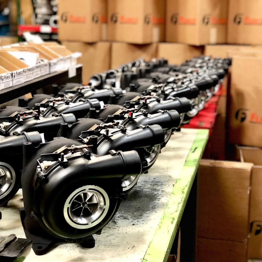 Row of Fleece Performance turbos ready to ship