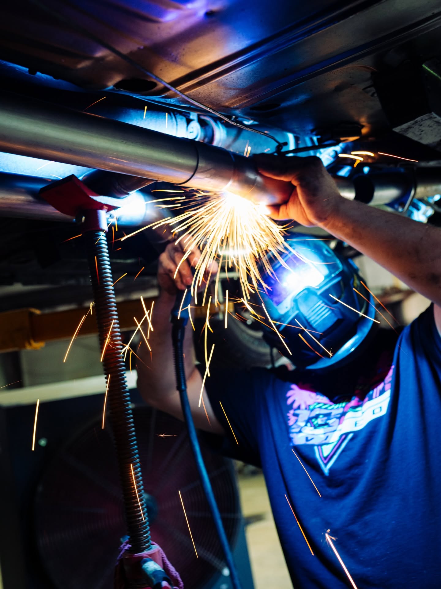 Welding exhaust under a truck