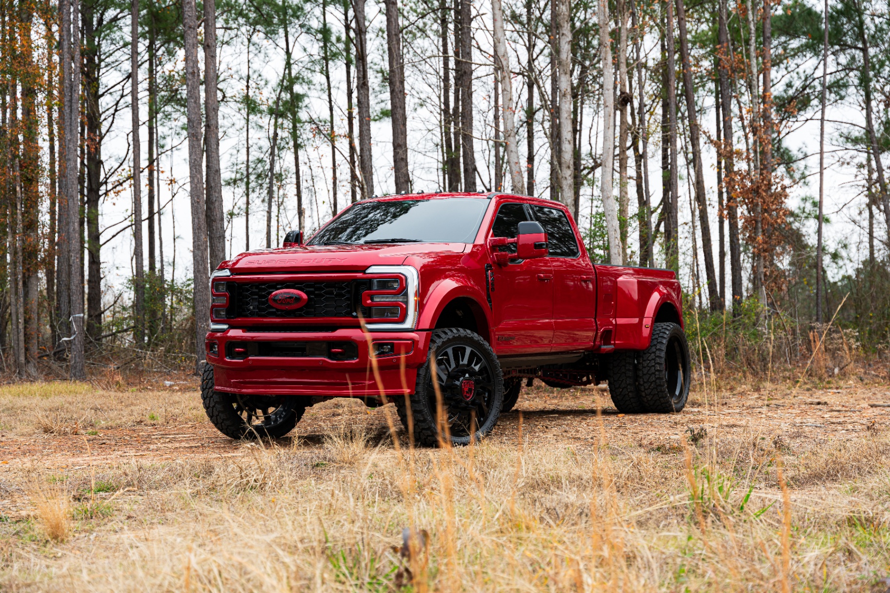 Red Ford Super Duty diesel truck outdoors